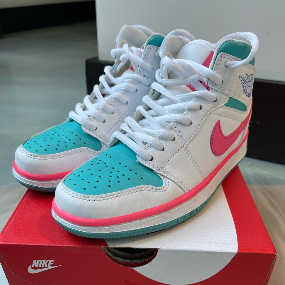 pink and blue Jordan’s